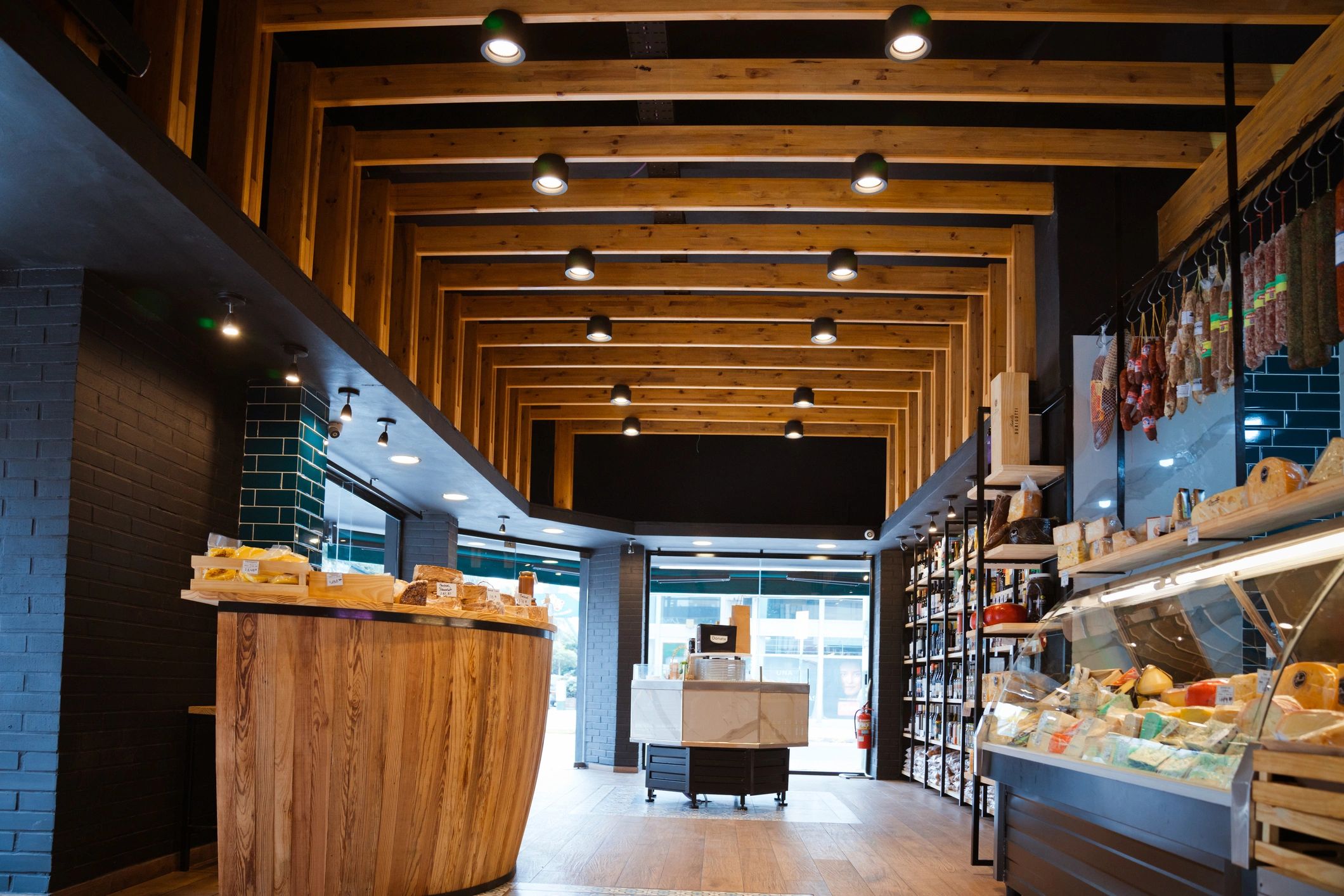 Modern liquor store interior with shelves of bottles