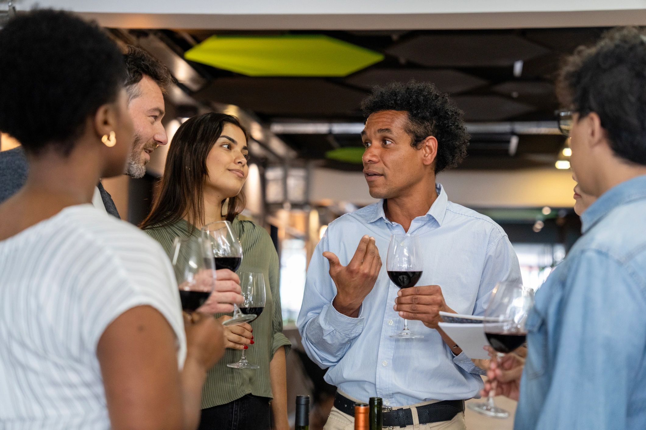 Happy people shopping for wine