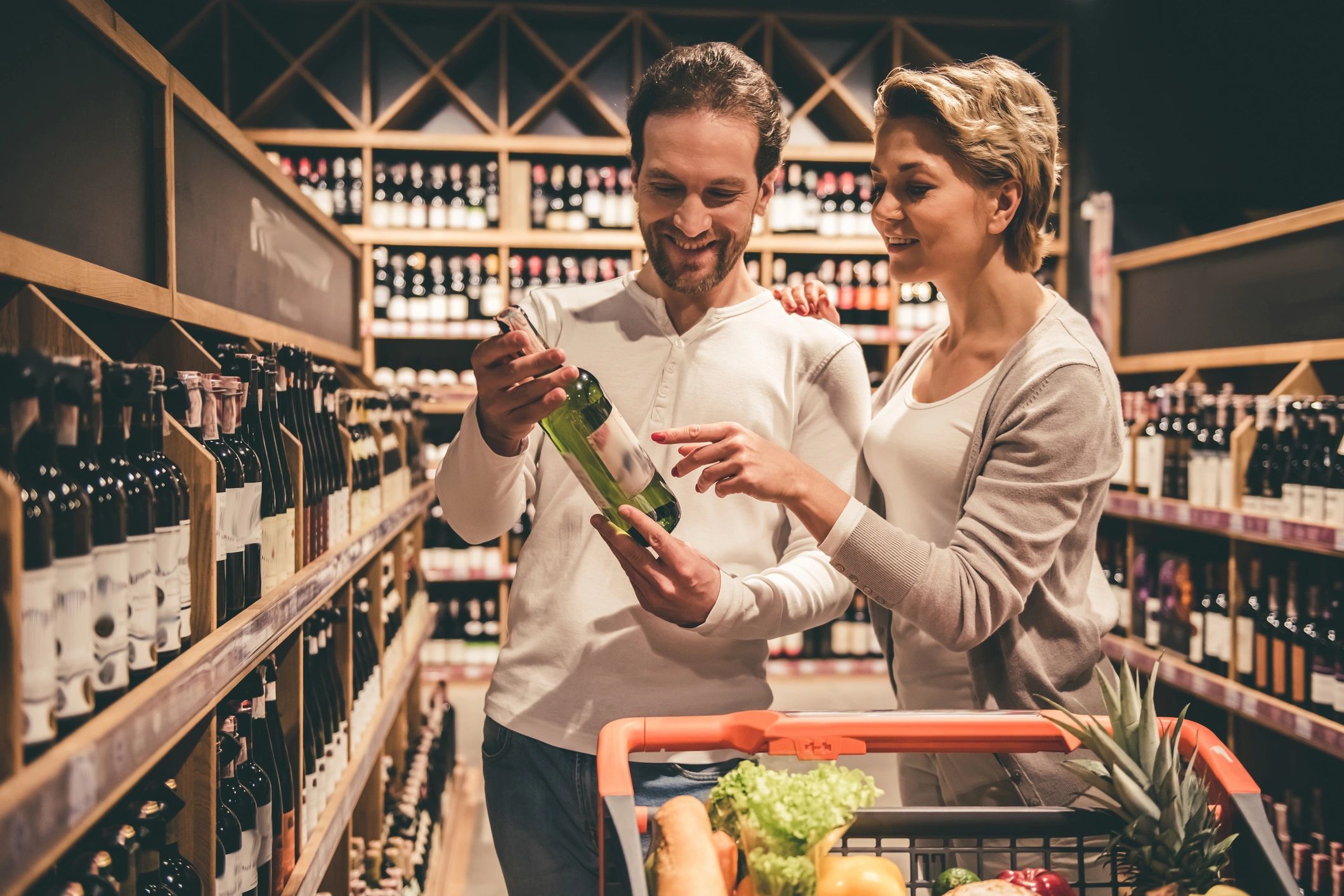 Happy customer shopping for wine